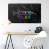 Black syringe rave flag above desk showing peace heart yinyang handshake icons with P.L.U.R text
