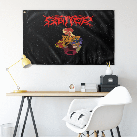 Skeleton ribcage rave flag hung on wall above a desk with lamp and chair