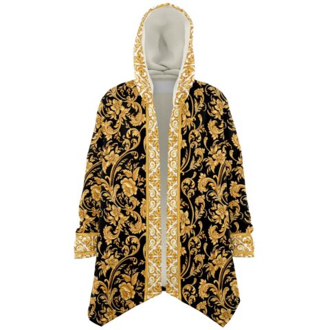 Black skull rave cloak worn open, showing the gold floral pattern