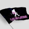 Side angle of the flailing flamingos flag waving showing bigfoot silhouette and starry print
