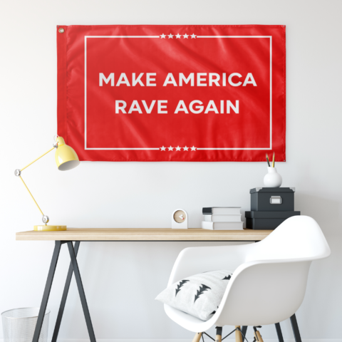 Red Make America Rave Again flag hung above a desk in a modern room setting