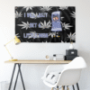 Black cartoon anthropomorphic rave flag hung above a desk showing leaf print and stoned towel