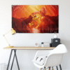 Fiery orange fantasy rave flag hung on wall above desk with yellow lamp