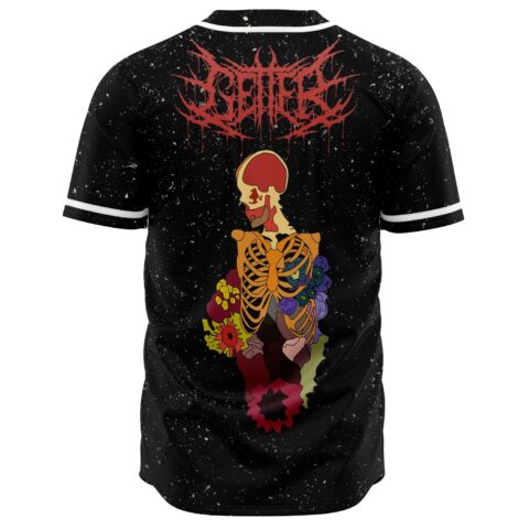 Back view showing floral skeleton graphic below red thorned logo on speckled black jersey