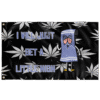 Black rave flag with leaf print and cartoon-style towel character reading I will just get