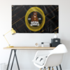 Bear Grillz cartoon character flag hung above a desk showing black and gold streak design
