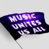 Black galaxy rave flag waving on pole showing glowing purple nebula text