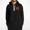 Front view worn on model showing small red portal chest print on black star-print hoodie