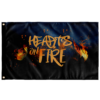 Hearts on Fire graffiti text flag with flame accents on dark navy backdrop flat view