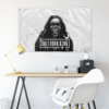 Sullivan King grayscale photo flag above a desk with distressed splatter texture and bird emblem