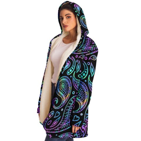 Neon paisley rave cloak side view showing sherpa-lined hood over black and pastel print