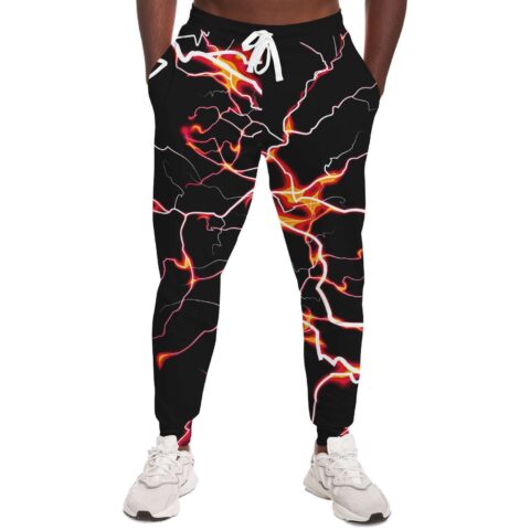 Front view of man wearing black lightning joggers with white drawstring waist and sneakers