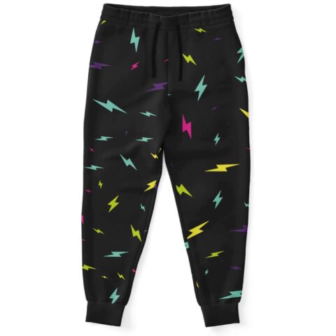 Front view of black scattered lightning rave joggers with neon bolt print and drawstring waist