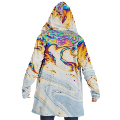 Back view of oil slick soap print cloak on model with hood up