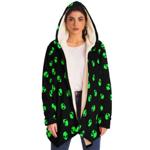 Alien face pattern rave cloak worn open front view showing cream sherpa lining