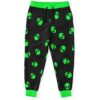 Black scattered green alien head joggers front view with neon green cuffs and waistband