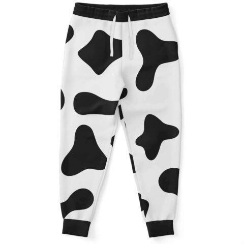 Cow print rave joggers front view with black spots on white fleece and drawstring waist