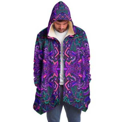 Front view of man wearing open psychedelic mandala print hooded rave cloak with sherpa lining