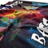 close-up of folded fabric showing cartoon characters and bass face graffiti text on nebula print