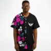 man wearing pink rose split baseball jersey with wing logo front view