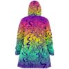 Liquid marble swirl print covers this rainbow rave cloak back view flat
