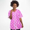 Woman wearing pink monogram rave baseball jersey with Riddim text front view
