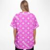 Back view of model wearing pink monogram print jersey with diagonal Riddim lettering