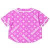 Back of the pink rave crop top with the Riddim wordmark repeated across the monogram pattern