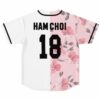 Pink floral split rave baseball jersey with custom name and number over floral and white panels, back view
