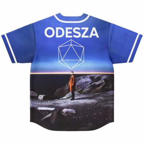 Back view of blue rave jersey with bold festival-themed lettering over twilight beach scene