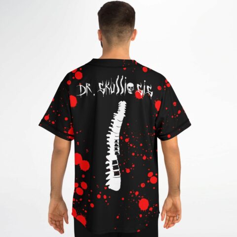 Dr Skullosis text and spine print on back of blood splatter jersey worn by model