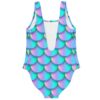Turquoise mermaid rave swimsuit back view showing scoop back and scale pattern