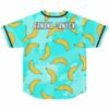 Banana Canyon text across shoulders on turquoise banana print jersey back view flat lay