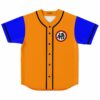 Flat lay of orange and blue baseball jersey with anime-inspired circular emblem on the chest
