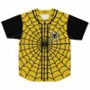 Yellow spider web print baseball jersey with black sleeves and spider logo patch front view