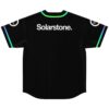 Back view of black jersey with rainbow trim collar and Solarstone text across shoulders