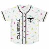 White baseball jersey with scattered neon lightning bolt print and bird logo on chest