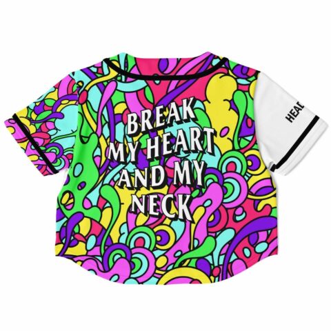 Back view of cropped jersey with vibrant abstract design and text