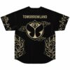 Black back view with gold eye emblem, ornate botanical panels, and TOMORROWLAND text