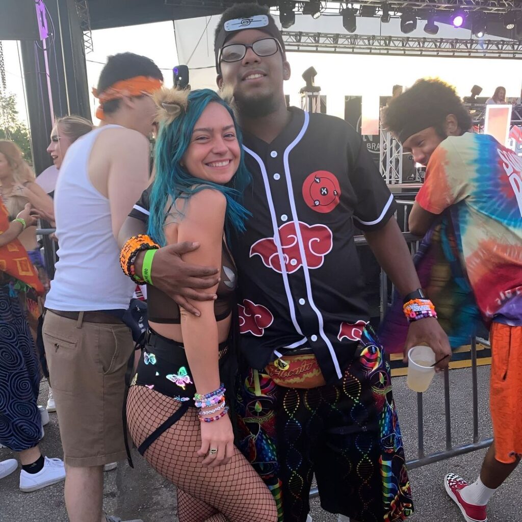 Couple with a matching Rave Outfit