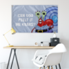 Cartoon crab rave flag hung above a desk showing meme text and snail-inspired art