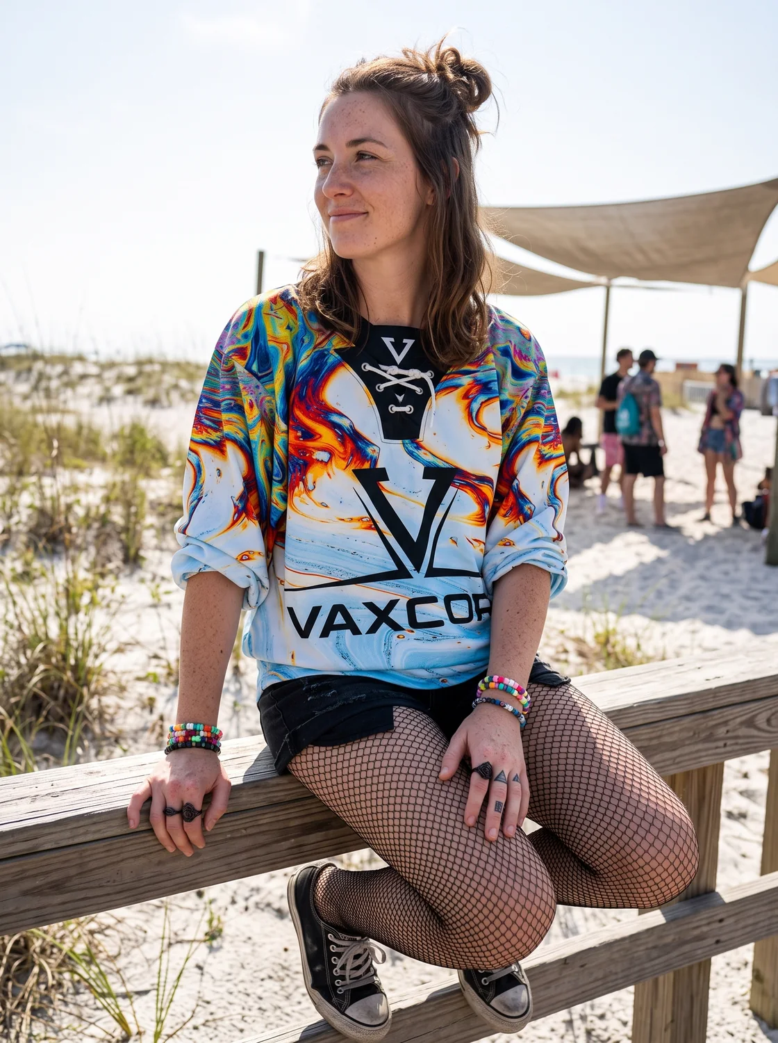 Woman wearing an oversized hockey jersey with shorts and fishnets at a rave