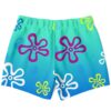 Teal blue outlined flowers rave swim trunks in flat lay showing back panel design