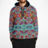 Man wearing teal kaleidoscope rave hoodie with red purple and yellow geometric doodle print