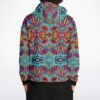 Close-up back shot of man modeling teal kaleidoscope doodle hoodie with black hem