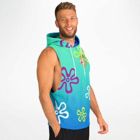 Model wearing bright floral sleeveless hoodie in outdoor setting.
