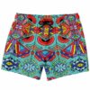 Turquoise kaleidoscopic rave swim trunks with mirrored geometric mask pattern front view