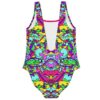 Mirrored abstract swirl swimsuit showing deep back cutout and neon symmetrical print