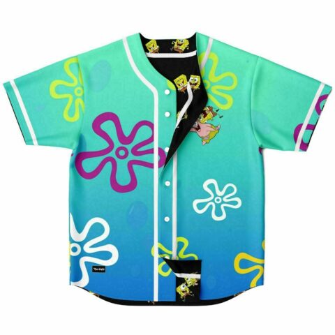 Reversible baseball jersey flat lay in teal-to-blue gradient with sponge-character pattern and flower print, black