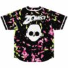 Back view of black jersey showing Zomboy text above skull graphic amid falling flower petals